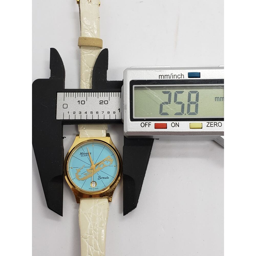 Nivada Bermuda island watch. Blue ocean color face with island. Working watch